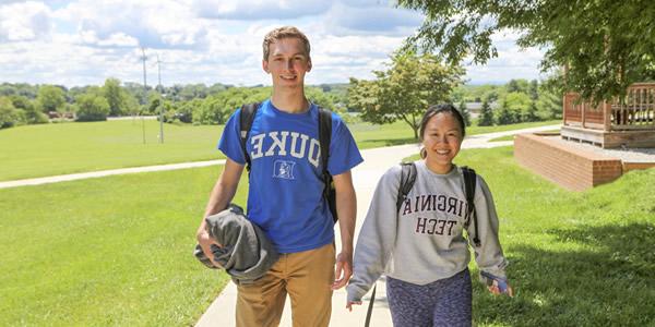 Graphic of Students Walking down a side walk
